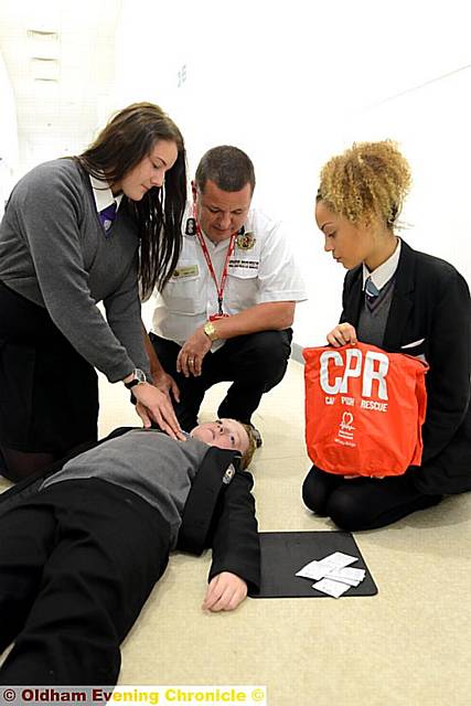 Station commander John Lake with pupils John Heywood, Emily Toop and Edna Gomes at Newman College