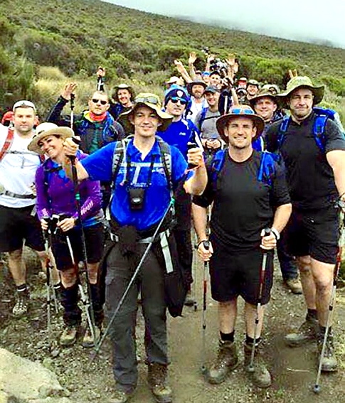 ALMOST there . . the team, which included Barrie McDermott (right) ascend Kilimanjaro ALMOST there . . the team, which included Barrie McDermott (right) ascend Kilimanjaro