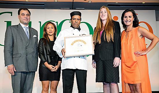 SPICE of life . . . award-winning Failsworth chef Mohammed Lulu Miah (centre) with (from left) Lord Karan Bilimoria, Quyen Pham, MP Angela Rayner and Nina Hossain
