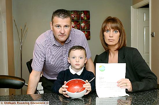 Harlie with his parents Mark and Sarah