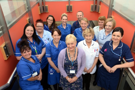 HAPPY to help . . . Cathy Allen (centre), cluster performance lead, pictured with Failsworth and Werneth community nursing team