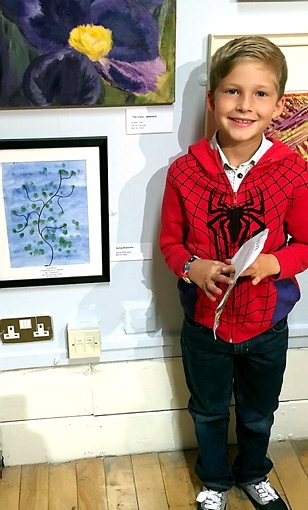 A BRUSH with fame . . . young Jacob Robinson with his painting at the Oldham Open A BRUSH with fame . . . young Jacob Robinson with his painting at the Oldham Open