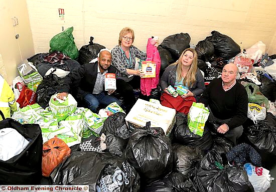 REFUGEE relief . . . from left, councillors Fazlul Haque, Sue Dearden, organiser Elaine Taylor and Graham Shuttleworth