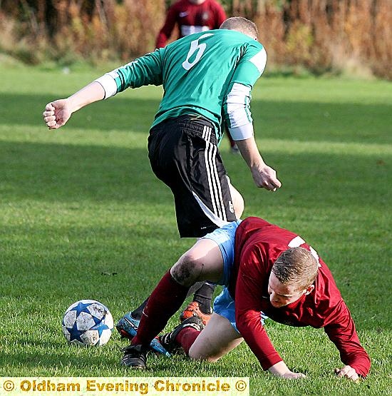 GROUNDED . . . Paul Hinchliffe (left), player-manager of Oldham Hulmeians, challenges for the ball. PICTURE: PAUL STERRITT GROUNDED . . . Paul Hinchliffe (left), player-manager of Oldham Hulmeians, challenges for the ball. PICTURE: PAUL STERRITT