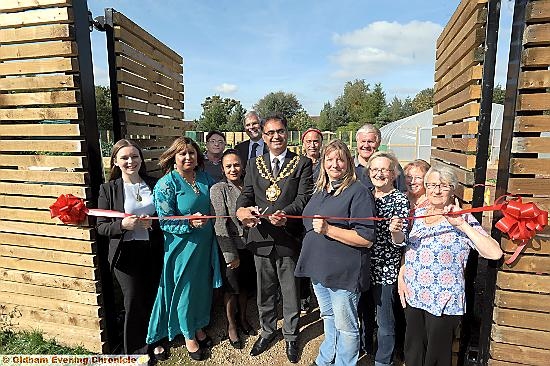 THE Mayor, Councillor Ateeque Ur-Rehman, cuts the ribbon to an open day at the popular Waterhead growing hub THE Mayor, Councillor Ateeque Ur-Rehman, cuts the ribbon to an open day at the popular Waterhead growing hub