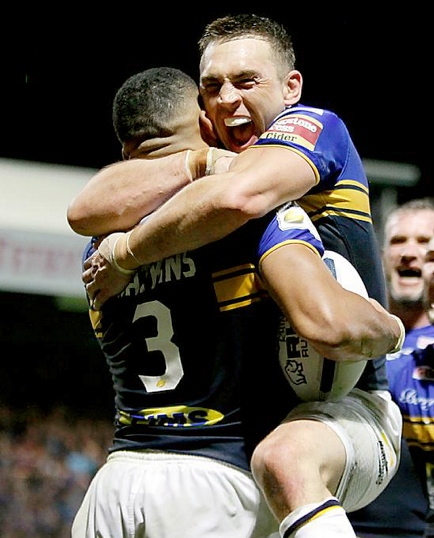 SO GOOD: Kevin Sinfield celebrates as Leeds Rhinos claim the league leaders’ shield.