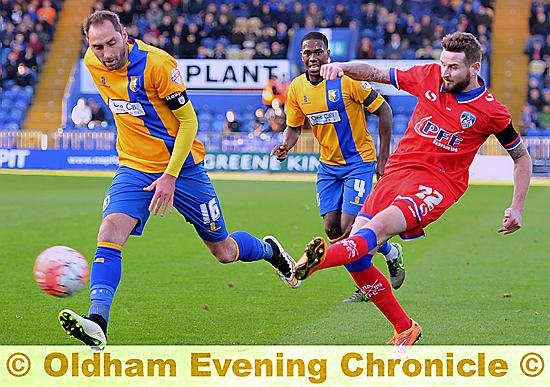 GIVE ME THE BALL . . . Mark Yeates never hides during games, says Manager. GIVE ME THE BALL . . . Mark Yeates never hides during games, says Manager.