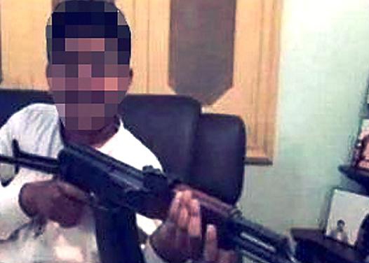 THE shocking image with the boy’s face obscured. THE shocking image with the boy’s face obscured.