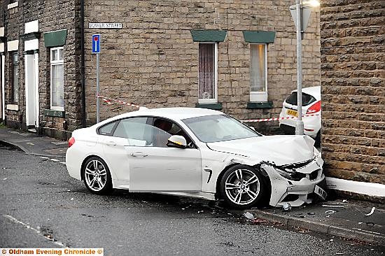 Crash at Miles St involving 3 cars one parked

One of which hit house wall and fractured a gas Main