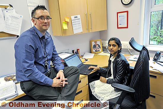 Take Over Day at Roundthorn Primary Academy school. PIC shows Andrew Hulmes (assistant principal) and pupil Alyia Mustafa (assistant principal for the day). 