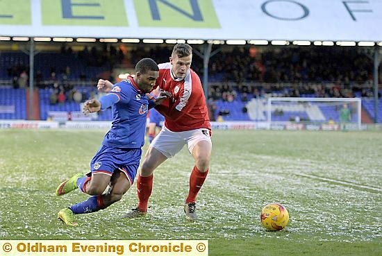 TOUGH GOING . . . Dominic Poleon struggles to shake off his marker.