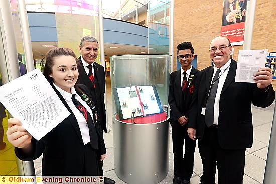 TOP of the class . . . head girl Leah Metcalfe, head teacher Hardial Hayer, head boy Moshin Khan and chair of governors Jim Greenwood
