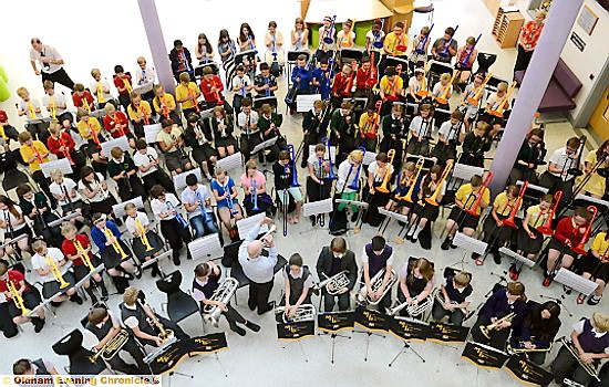 MUSICAL pupils are taught at Mossley Hollins School. MUSICAL pupils are taught at Mossley Hollins School.
