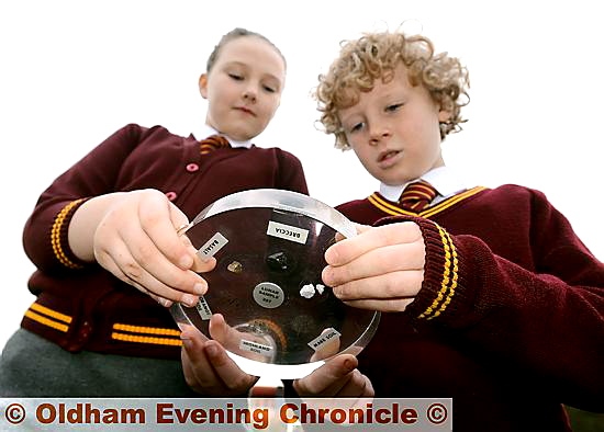 OVER the moon . . . Year 5 pupils Emma Slater and Malachy Handrick with the samples OVER the moon . . . Year 5 pupils Emma Slater and Malachy Handrick with the samples