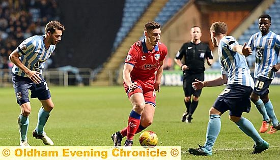 LOOKING FOR AN OPENING . . . lone striker Jake Cassidy tries to carve a chance for himself. Pictures by ALAN HOWARTH
