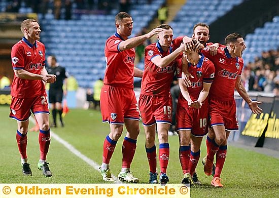 ROCKING . . . Danny Philliskirk celebrates his late equaliser against Coventry City PICTURE by ALAN HOWARTH. ROCKING . . . Danny Philliskirk celebrates his late equaliser against Coventry City PICTURE by ALAN HOWARTH.
