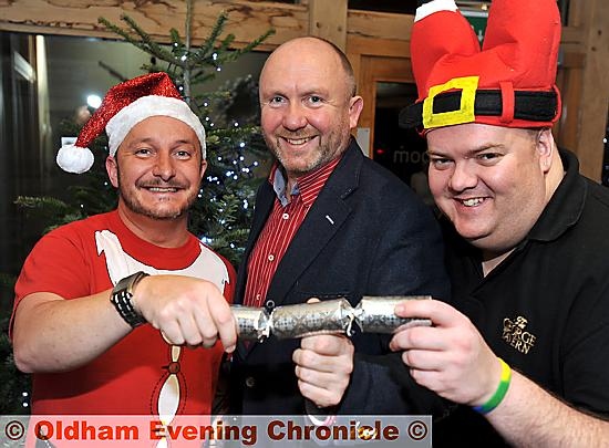 CHRISTMAS Angels: (l-r) organiser Neil Greenwood, Charles Brierley of the White Hart and George Tavern landlord George Campbell.