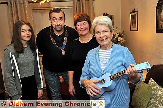 CHRISTMAS wish: Vilma Smith with her ukulele, granddaughter Emily Martin, daughter Corinne Ogden and Saddleworth Round Table chairman Matthew Sykes CHRISTMAS wish: Vilma Smith with her ukulele, granddaughter Emily Martin, daughter Corinne Ogden and Saddleworth Round Table chairman Matthew Sykes