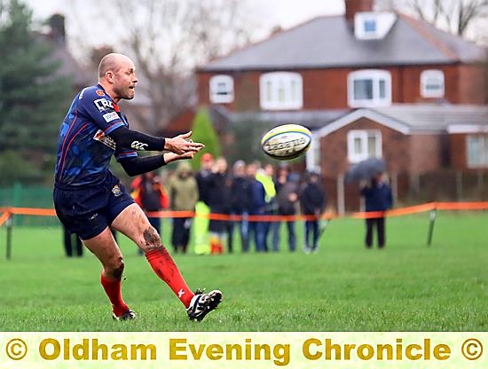 ON THE FRONT FOOT: Gareth Barber throws a pass for Oldham. Picture: TIM ABRAM.
ON THE FRONT FOOT: Gareth Barber throws a pass for Oldham. Picture: TIM ABRAM.
