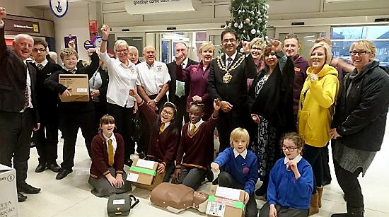 LIFESAVERS . . . Oldham Mayor, Councillor Ateeque Ur-Rehman, presents the defibrillators at Sainsbury’s LIFESAVERS . . . Oldham Mayor, Councillor Ateeque Ur-Rehman, presents the defibrillators at Sainsbury’s