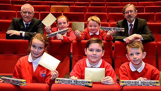 WINNERS . . . front row: Lea Lees, Dominic Collins and Mason Mattocks. Back, Peter Cushing, Kadie Miller, Henry Nicklin, and Councillor Andrew Fender, chair of TfGM
