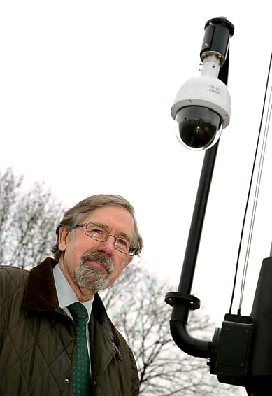 KEEPING watch . . . Councillor Andrew Fender with one of the new telescopic cameras KEEPING watch . . . Councillor Andrew Fender with one of the new telescopic cameras