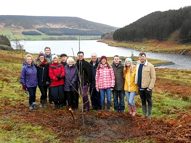 A TRANQUIL moorland wood created in memory of loved ones has reached a poignant milestone with the planting of the 50th tree.
The family of Royton man, Jack Whittle, planted a rowan tree in the Celebration Wood at RSPB Dovestone, Greenfield, in respect of the much-loved husband, dad and granddad.
The wood, the first of its kind for the RSPB, offers people a chance to contribute towards the creation of a wild woodland on a spectacular reserve. A TRANQUIL moorland wood created in memory of loved ones has reached a poignant milestone with the planting of the 50th tree.
The family of Royton man, Jack Whittle, planted a rowan tree in the Celebration Wood at RSPB Dovestone, Greenfield, in respect of the much-loved husband, dad and granddad.
The wood, the first of its kind for the RSPB, offers people a chance to contribute towards the creation of a wild woodland on a spectacular reserve.