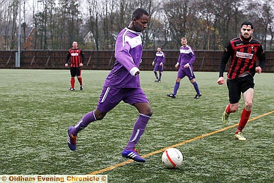 GO FOR IT . . . Roufaye Aidara makes a break for Santos. GO FOR IT . . . Roufaye Aidara makes a break for Santos.