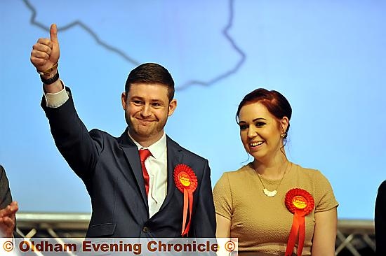 THUMBS UP: Jim McMahon salutes his supporters alongside partner Charlene as the result is announced. 