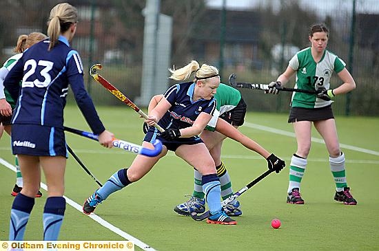 Louise Howard shoots at goal Louise Howard shoots at goal