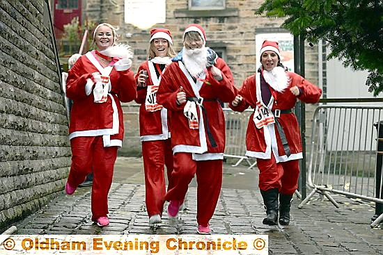 ON the run . . . Santa dash runners (from the left) Claire Breen, Carol Price, Melanie Whittle and Gabriella Maragioglio.
