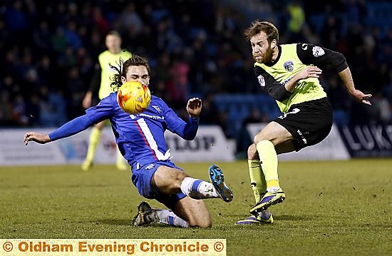 JAMES Dayton attempts to force the ball into the penalty area during Saturday’s defeat by Gillingham. 