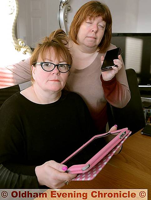 HANGING on for a line: Joanne Cumberbirch (left) and partially sighted Katherine Haslam. HANGING on for a line: Joanne Cumberbirch (left) and partially sighted Katherine Haslam.