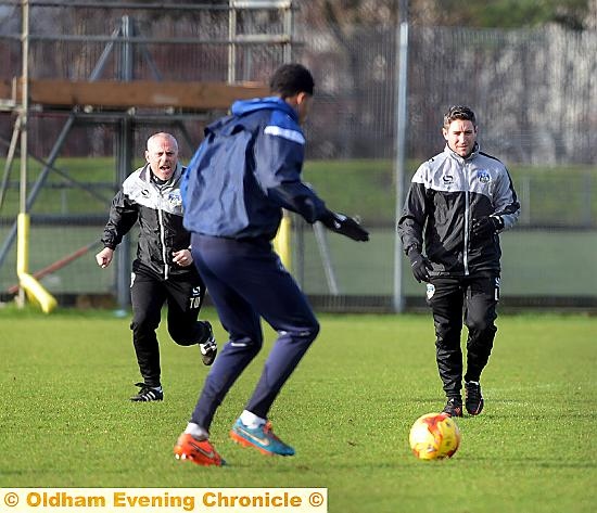 BUSINESS AS USUAL: boss Lee Johnson (right) keeps training on an even keel despite events of the week. PICTURE: ANTHONY MILLER