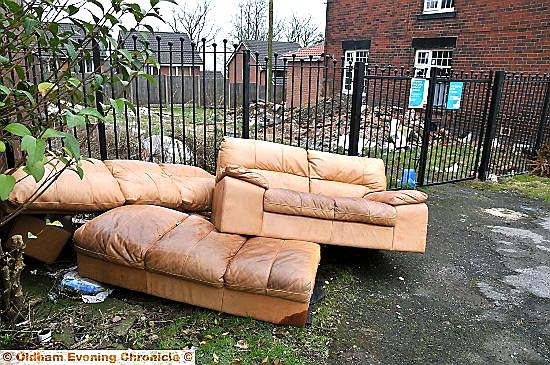 THE dumped sofas - and the tipping warnings on the gate