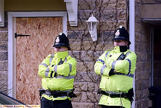 POLICE outside the Hanover Street address.