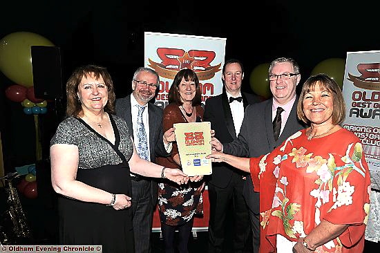 HERE’S to success . . . guests the Rev Jean Hurlston, co-ordinator of Oldham Street Angels, David Martin, executive director Oldham Coliseum, Councillor Barbara Brownridge, co-operatives and neighbourhoods portfolio holder, GMP chief insp Andrew Harty, Joe Curran, Best Bar None ambassador, and Janet Sewart lead commissioner for alcohol and drugs at Oldham Council