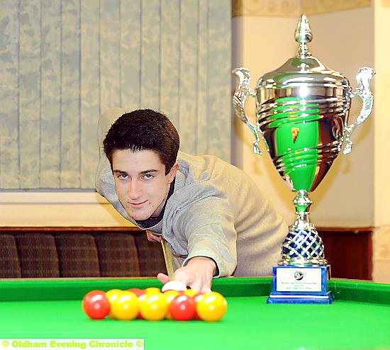 MALTESE MAGIC . . . Aaron Davies shows off the trophy he won on the Mediterranean island. 