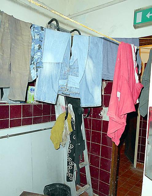 SQUALOR: washing hanging above the urinal in the gents toilets