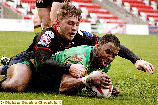 TRY: Michael Lawrence (left) crosses for Oldham. PICTURE: PAUL STERRITT