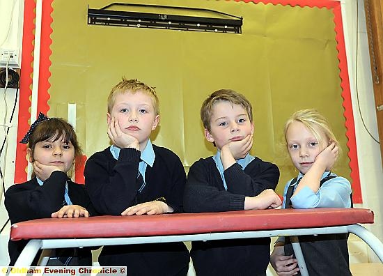 Pupils looking glum were Flat Screen TV was once hung on the wall.