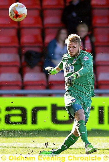 DREAM DEBUT: Joel Coleman clears the ball upfield against Crewe. 