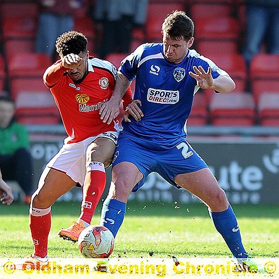 INSTANT IMPACT . . . Anthony Gerrard (right) has slotted into the centre of Athletic’s defence with impressive ease.