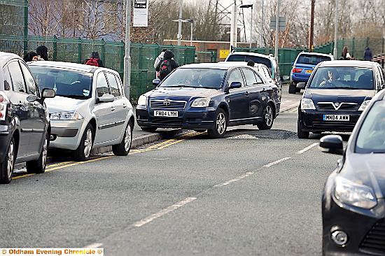 SNARLED up: bad parking causes traffic problems on Hunt Lane SNARLED up: bad parking causes traffic problems on Hunt Lane