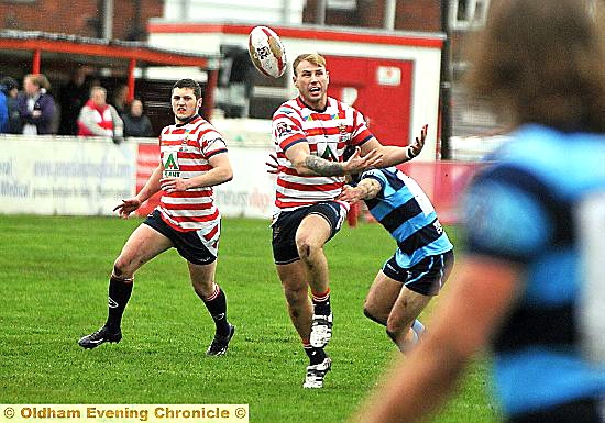 SPILLED: Danny Langtree can’t keep hold of the ball under pressure. 