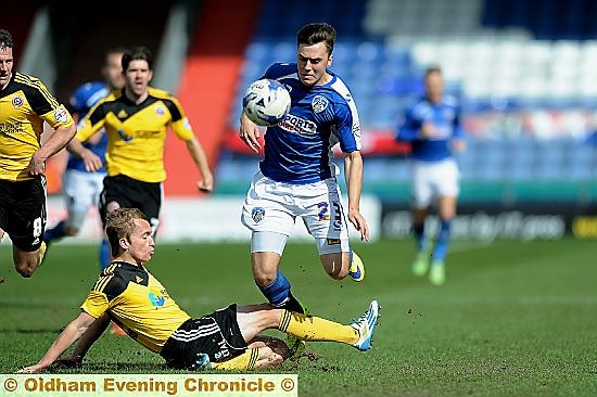 BE POSITIVE . . . Rhys Turner tries to launch an attack.