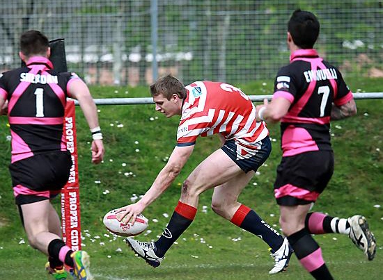 TRY TIME: Jon Ford touches down for Oldham.