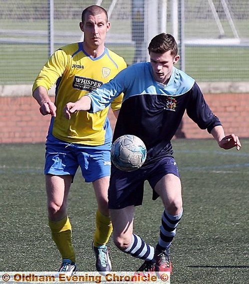 IN CONTROL . . . Hollinwood’s Callum Neville (right).
