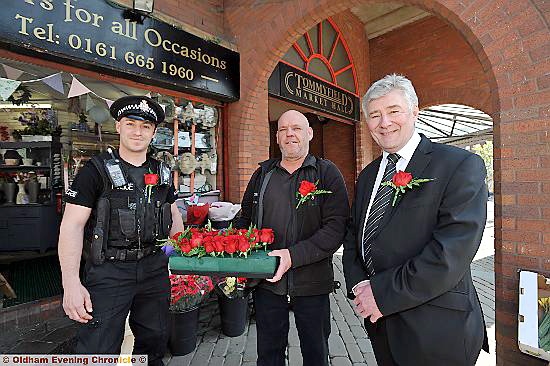 TONY on tour . . . Tony Lloyd with PC Paul Rainsford and local florist Dale Robinson