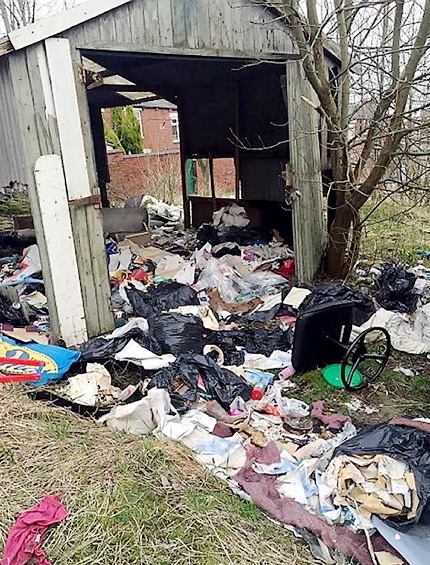 DILAPIDATED . . . the garage is in a very poor state of repair following arson attacks